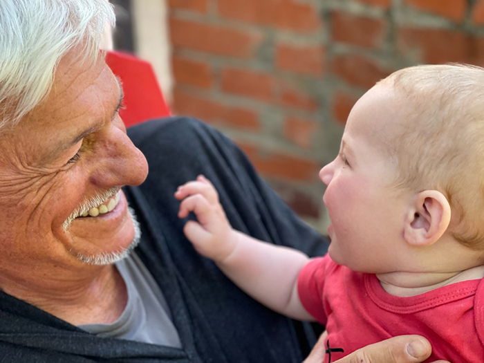 Charly Kleissner and grandson, Keapo. Photo credit: Lisa Kleissner.